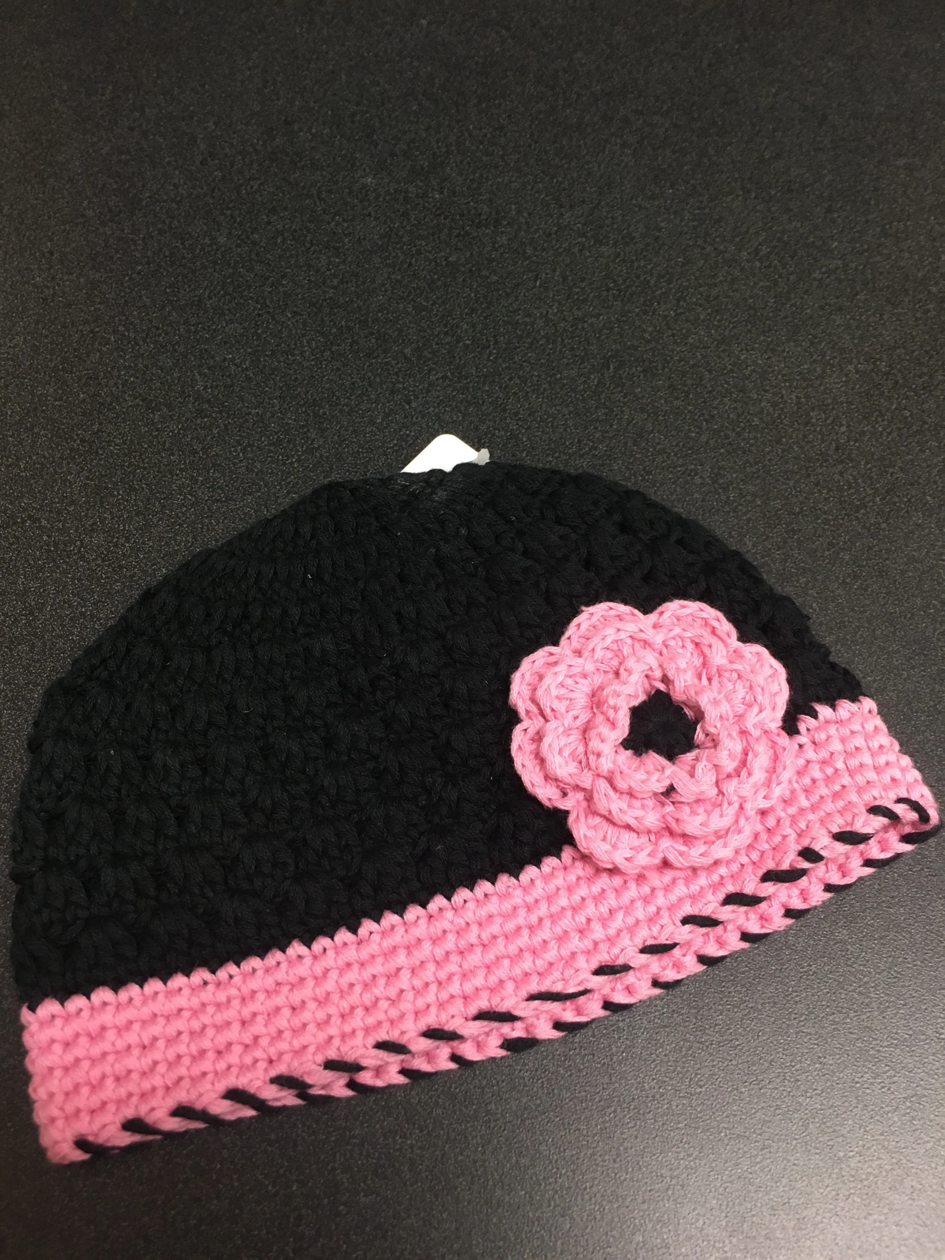 Black and Pink Crochet pull on hat with flower